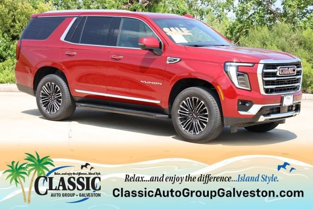 2025 GMC Yukon Elevation in Volcanic Red Tintcoat — front three-quarter view