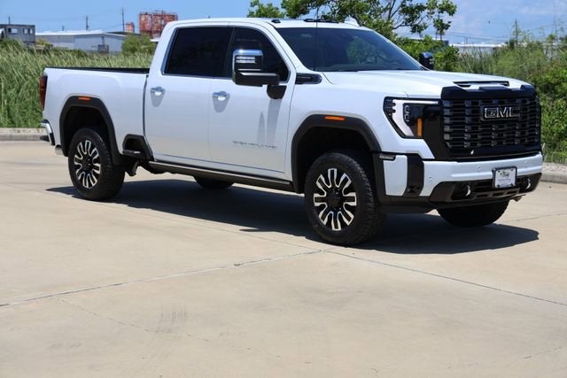 2026 GMC Sierra 2500 HD Denali Ultimate in Glacier White Tricoat — front three-quarter view