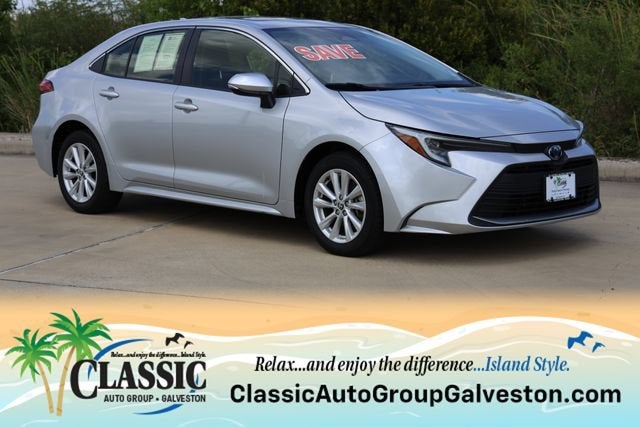2023 Toyota Corolla Hybrid LE in Sil — front three-quarter view